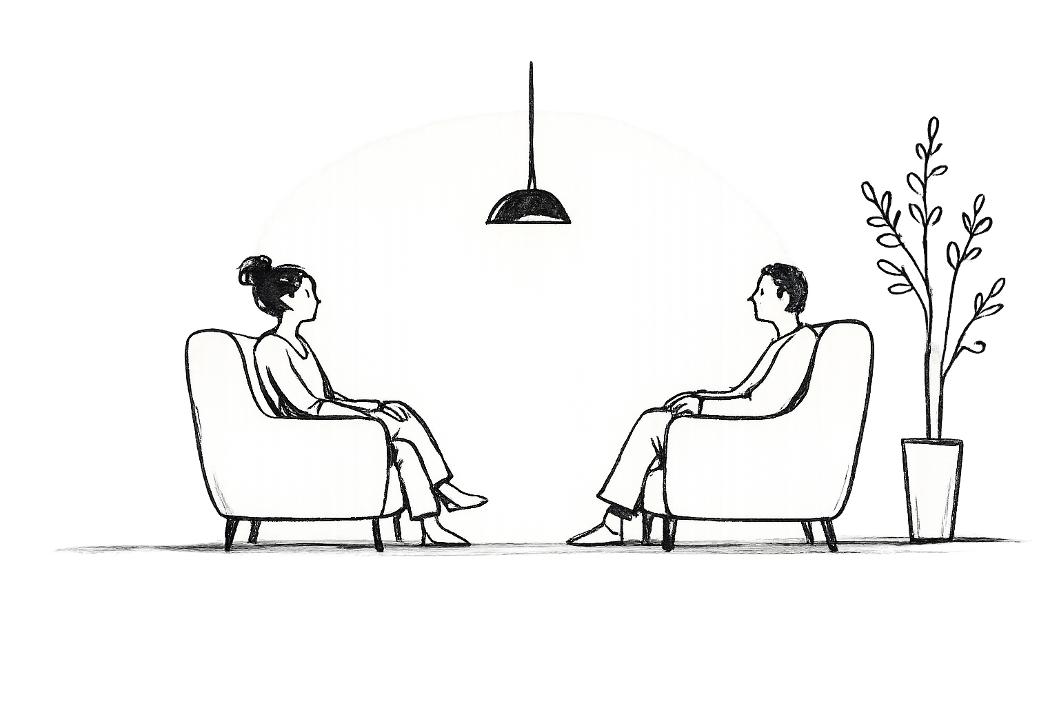 Dos personas conversando en un espacio terapéutico